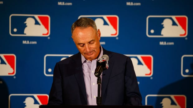 Feb 21, 2017; Phoenix, AZ, USA; Major League Baseball commissioner Rob Manfred reacts as he speaks to the press during Spring Training Media Day at The Arizona Biltmore. Mandatory Credit: Mark J. Rebilas-USA TODAY Sports